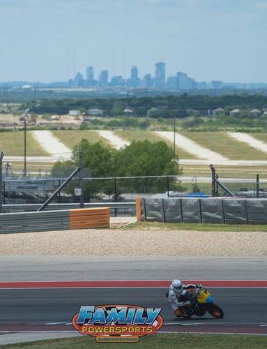 KTM with Austin skyline
